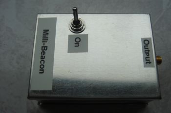 The "Milli-Beacon" signal source.